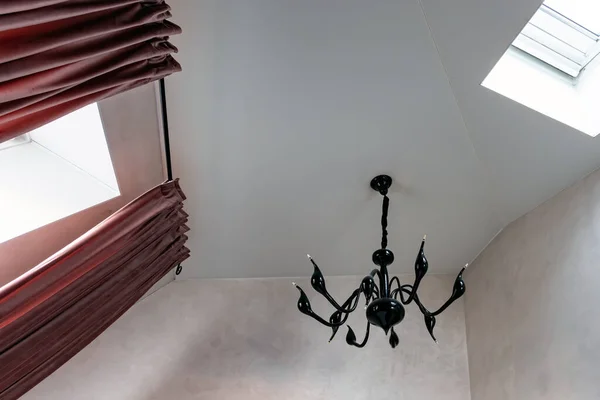 Light multistage plastered ceiling in a modern attic room with a Dormer window — Stock Image Light Multistage Plastered Ceiling Modern Attic Room Dormer Window Royalty Free Stock Photos