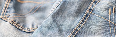 Mavi kot kumaşına yakın plan. Denim kot arka planı, dizaynınızı kopyalamak için boşluk.