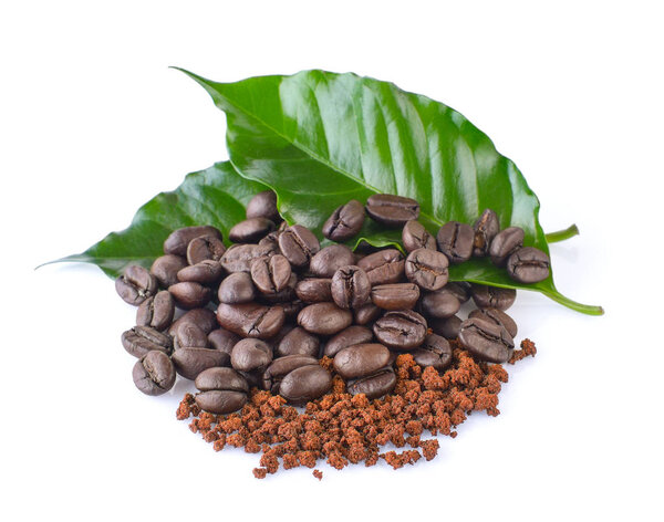 coffee beans , instant coffee and leaves on white background