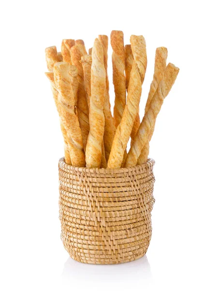 Pile of delicious pretzel sticks in basket isolated on white bac — Stock Photo, Image