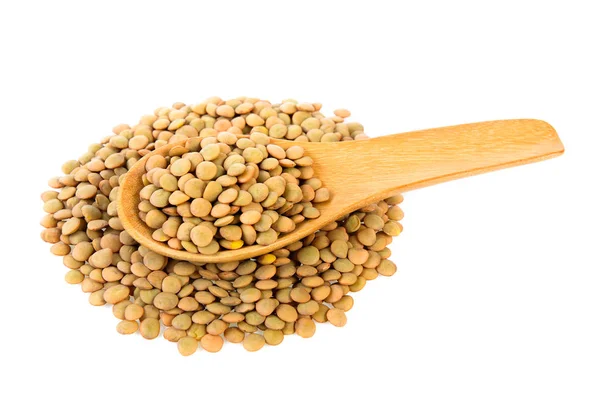 Lentils in wood spoon isolated on white background — Stock Photo, Image