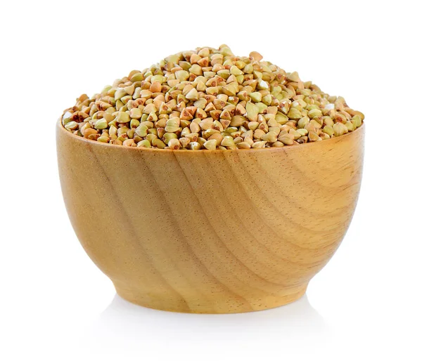 Buckwheat in wood bowl  isolated on white background — Stock Photo, Image