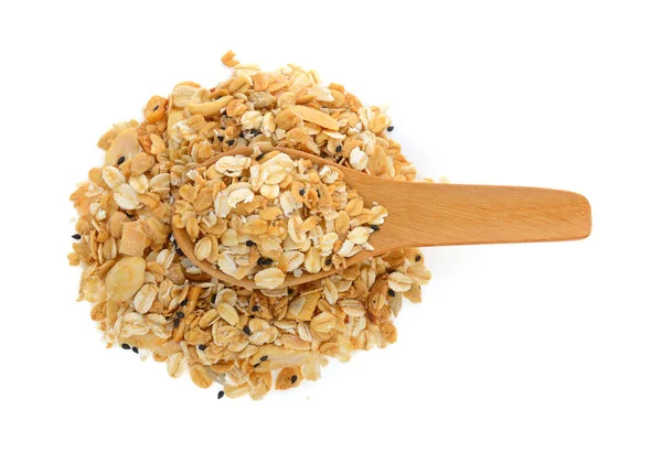 Nuts and seeds muesli in wood spoon isolated on white background — Stock Photo, Image