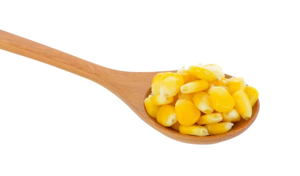 Corn seeds in wood spoon on white background — Stock Photo, Image