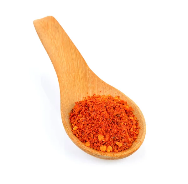 Cayenne pepper in wood spoon on white background — Stock Photo, Image