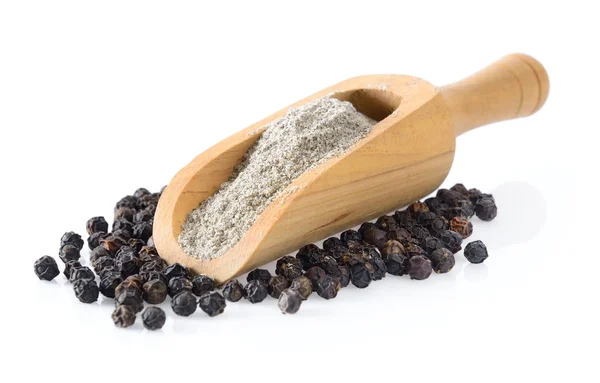 Black pepper powder in wood scoop on white background — Stock Photo, Image