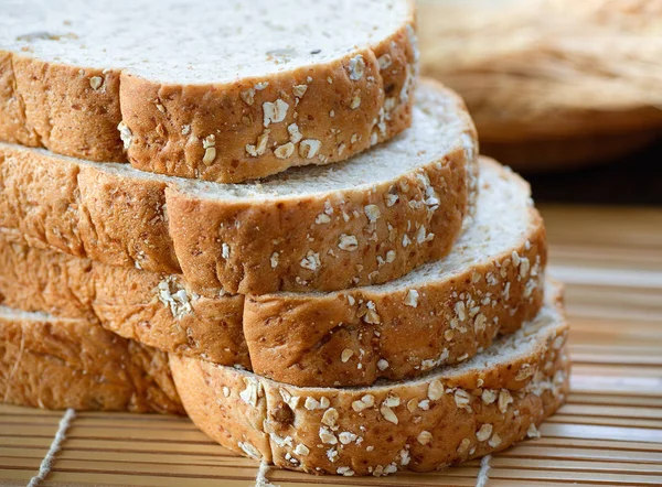 Whole wheat bread cut on slices — Stock Photo, Image