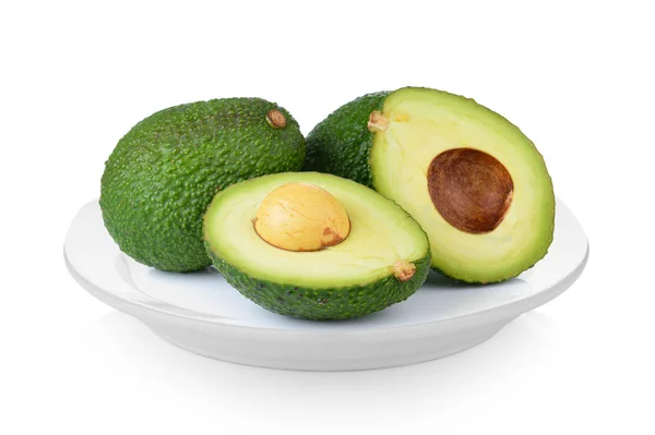 Avocado in white plate on white background — Stock Photo, Image
