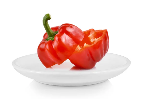 Red pepper in white plate on white background — Stock Photo, Image