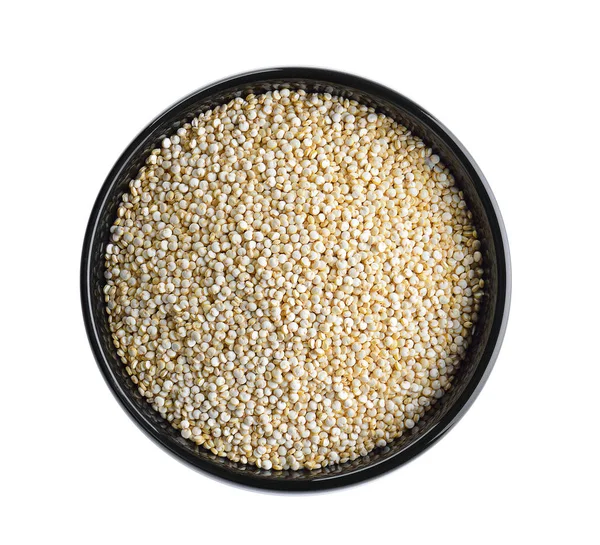 Quinoa in ciotola nera su sfondo bianco — Foto Stock