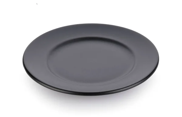 Black plate on white background — Stock Photo, Image
