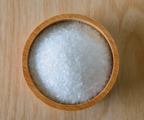 Monosodium Glutamate in wood bowl — Stock Photo, Image