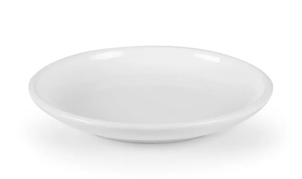 Белая серамическая пластинка на белом фоне — стоковое фото