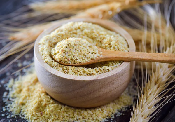 Wheat germ in wood bowl