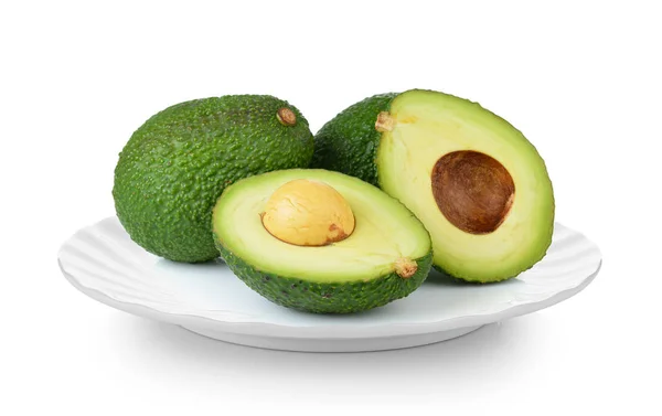 Avocado in white plate on white background — Stock Photo, Image