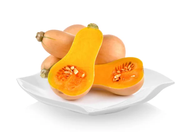 Butternut squash in plaat (mooie vorm) op witte achtergrond — Stockfoto