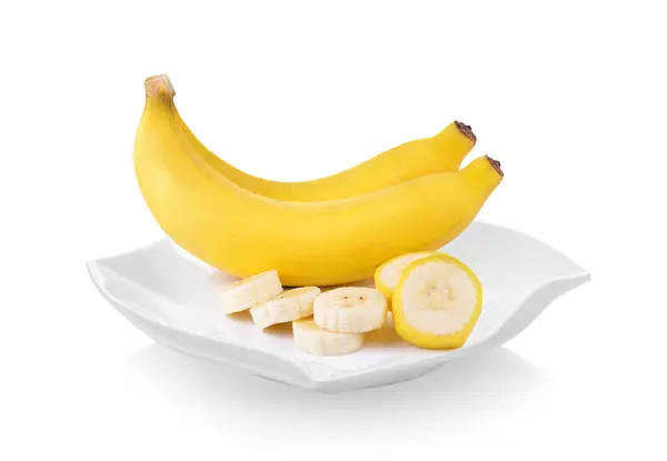 Bananes en assiette (belle forme) sur fond blanc — Photo