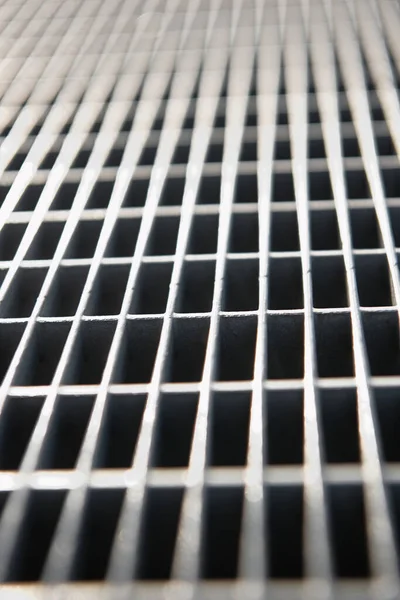 Metal lattice with small cells grid. Stock photo background with shallow DOF — Stock Photo, Image