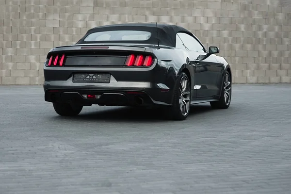 Kaunas, Lithuania - MAY 4, 2019: Gray american muscle car Ford Mustang GT with modifications standing alnone at city mall's parking. — Stock Photo, Image