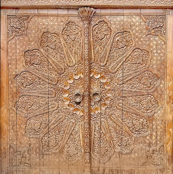 ancient patterned door entrance of old Islamic building