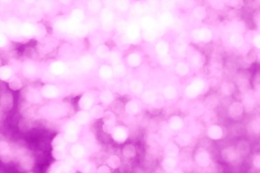 Bulanık pembe bokeh arkaplan.