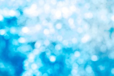 Bulanık mavi Kış Bokeh arkaplanı.
