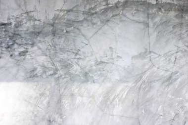 Bulanık gri beton doku arkaplanı.