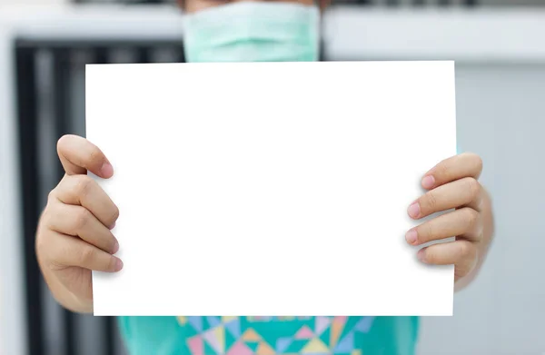 Woman standing posture holding blank white paper.