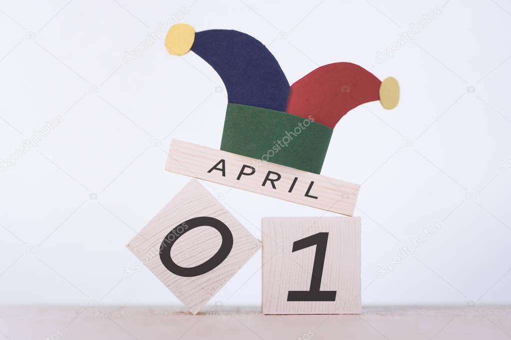 Fools' Day, date April 1 on wooden calendar