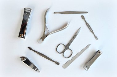 Manicure. Scissors, wire cutters, pusher, nail file clipart