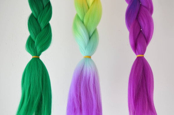 Kanekalon. Colored artificial strands of hair. Material for plaiting braids