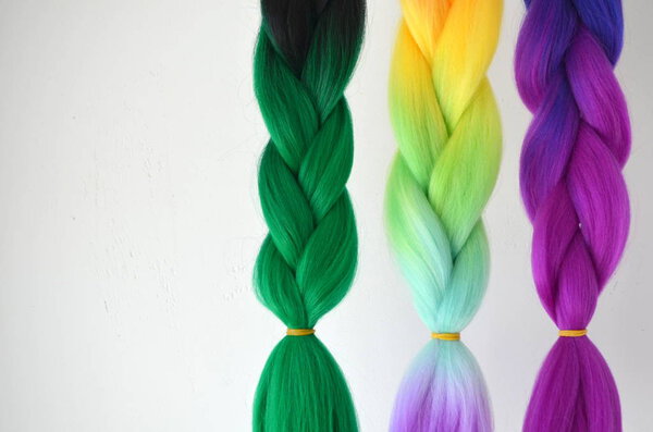 Kanekalon. Colored artificial strands of hair. Material for plaiting braids