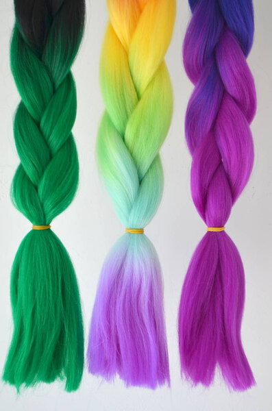 Kanekalon. Colored artificial strands of hair. Material for plaiting braids
