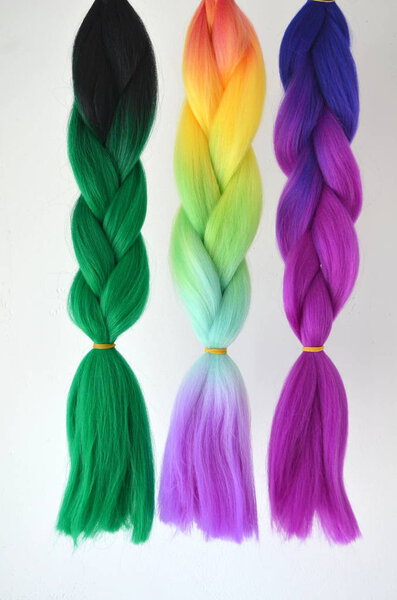 Kanekalon. Colored artificial strands of hair. Material for plaiting braids.