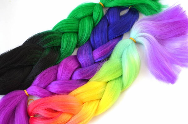 Kanekalon. Colored artificial strands of hair. Material for plaiting braids.