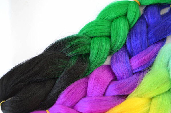 Kanekalon. Colored artificial strands of hair. Material for plaiting braids.
