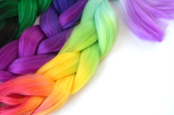 Kanekalon. Colored artificial strands of hair. Material for plaiting braids.