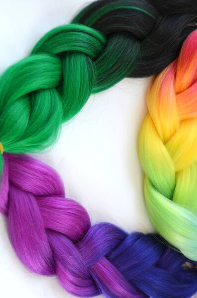 Kanekalon. Colored artificial strands of hair. Material for plaiting braids.