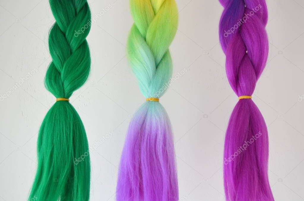 Kanekalon. Colored artificial strands of hair. Material for plaiting braids