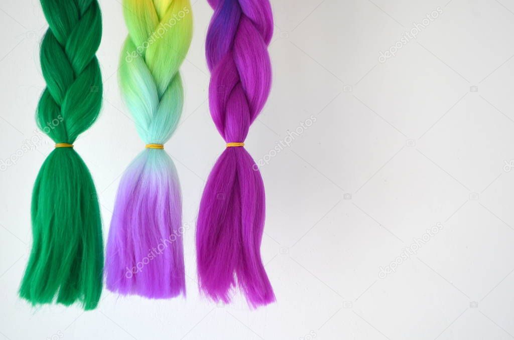 Kanekalon. Colored artificial strands of hair. Material for plaiting braids