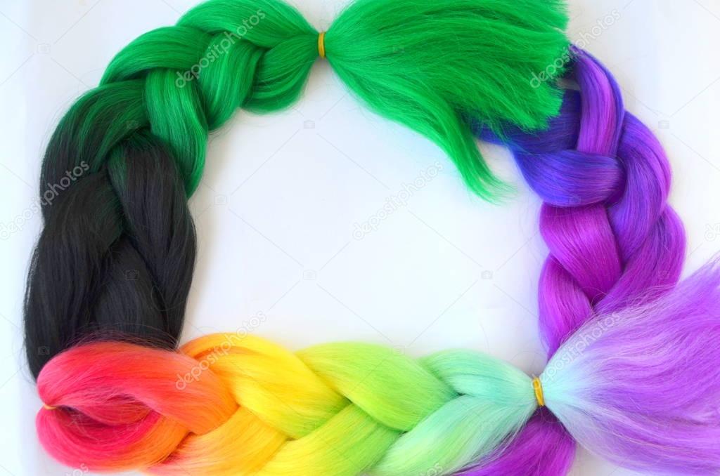 Kanekalon. Colored artificial strands of hair. Material for plaiting braids.