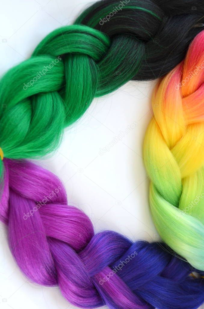 Kanekalon. Colored artificial strands of hair. Material for plaiting braids.