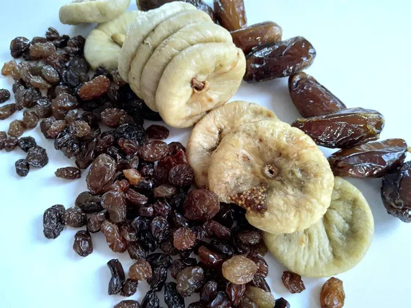 Dried fruits dates, figs and raisins