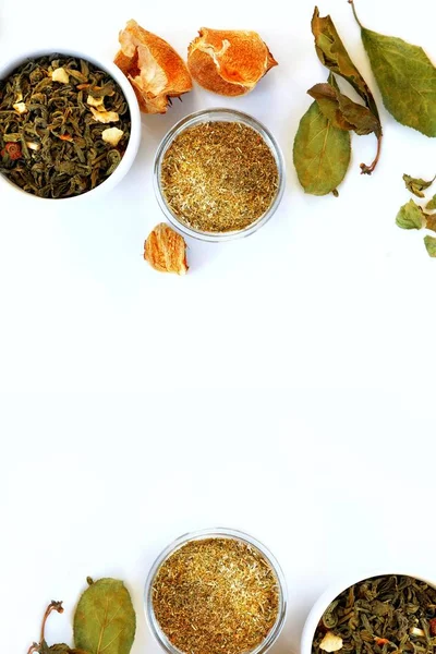 Dried medicinal herbs ingredients for medicinal tea, drink on a white background. Herbal treatment concept.Top view, close-up, copy space for text.