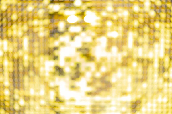 Abstracte wazig lovertje jurk kleurrijke bokeh goudkleurige licht. Ontwerp achtergrond. Disco kleur — Stockfoto