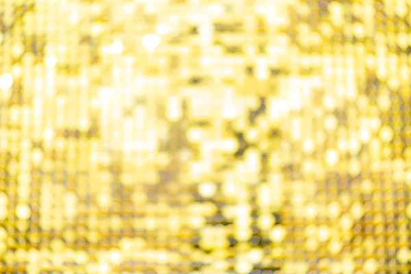 Abstracte wazig lovertje jurk kleurrijke bokeh goudkleurige licht. Ontwerp achtergrond. Disco kleur — Stockfoto
