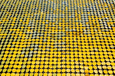 Yansıtıcı arka plan oluşturur. Altın tohumlar, ışıl ışıl, 