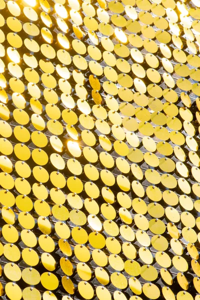Sequins reflecterende achtergrond. gouden pailletten, sprankelend, — Stockfoto
