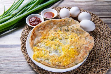 Pirinç soğanlı krep, yağlı ve doğranmış soğanlı Çin usulü, lezzetli ve mayasız bir ekmek..