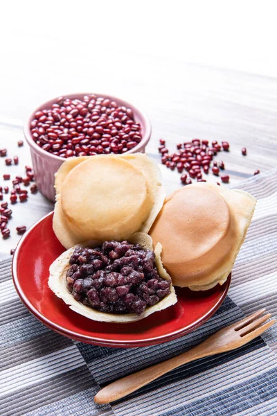red bean cake (Imagawayaki) is a Japanese dessert and filled with sweet azuki bean paste